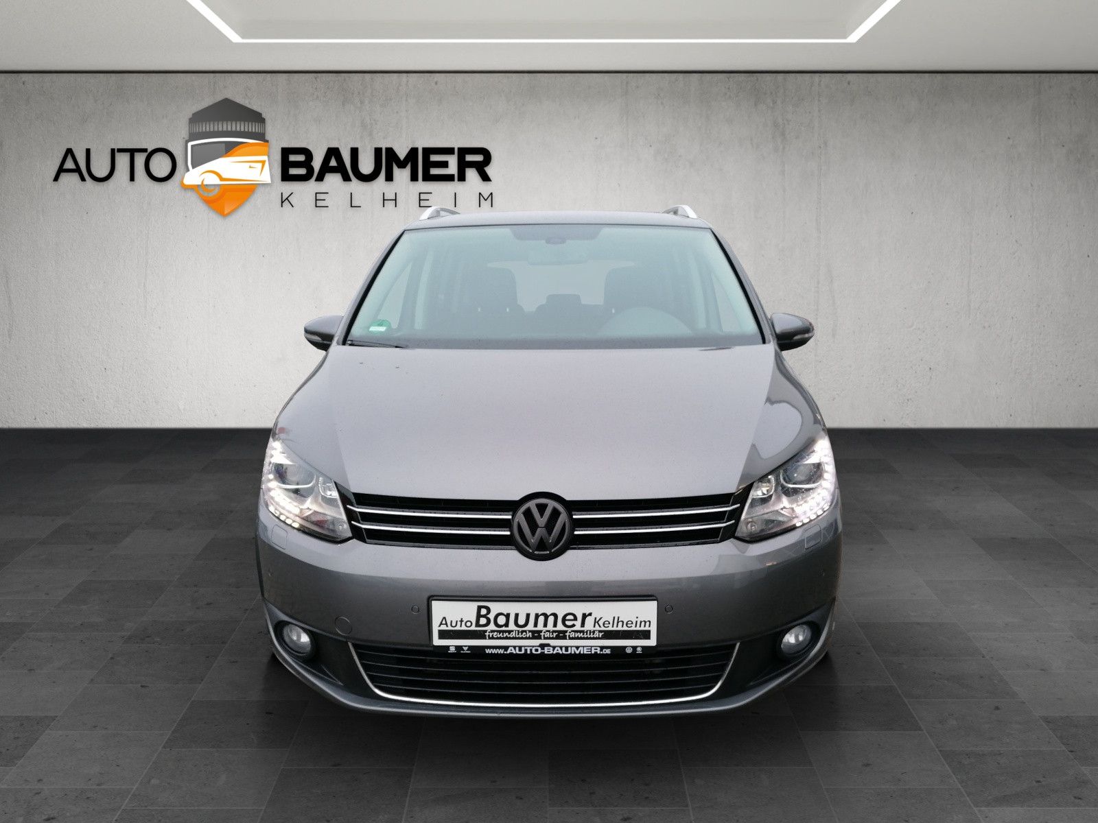 Fahrzeugabbildung Volkswagen Touran 1.4 TSI Cup AHK NAVI BI XENON PDC