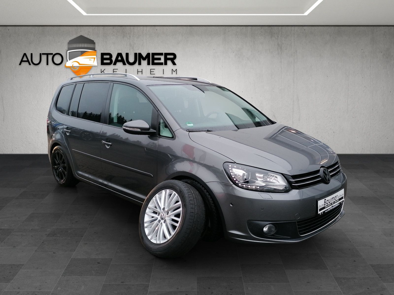 Fahrzeugabbildung Volkswagen Touran 1.4 TSI Cup AHK NAVI BI XENON PDC